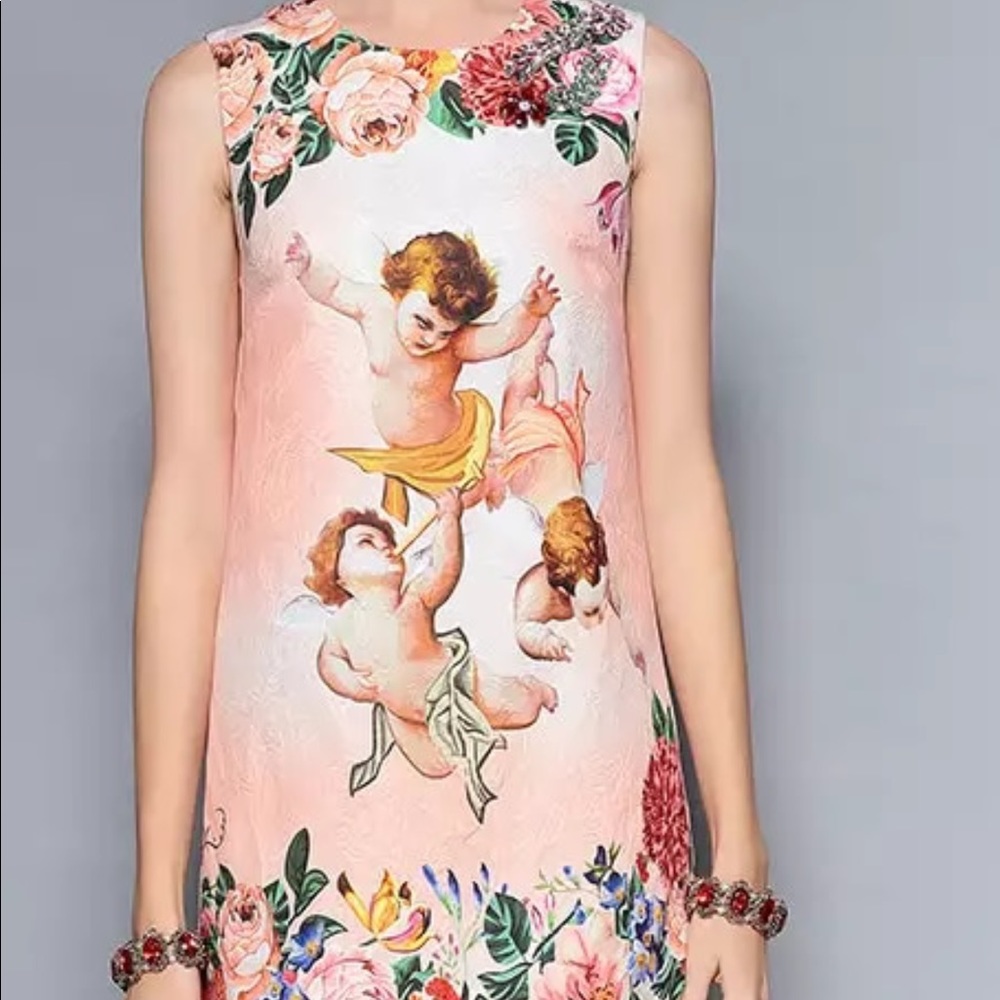 Dress with broderies and crystal ornement in pink